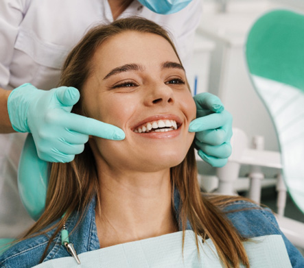 Woman smiling at the dentist