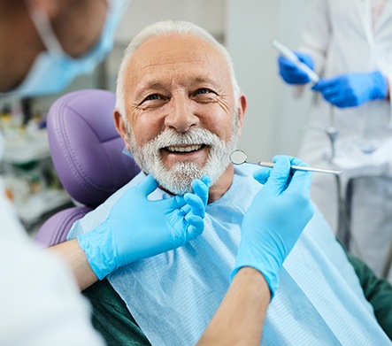 A man in a dentist&rsquo;s chair
