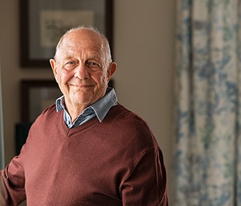 Closeup of senior man smiling at home