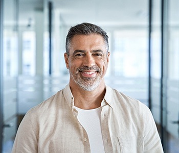 Closeup of man smiling in office